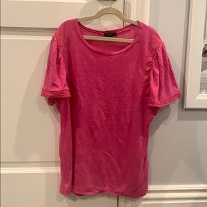 Pink short sleeve t-shirt.